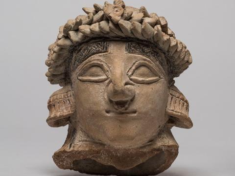 piccola testa, reperto archeologico di Cipro